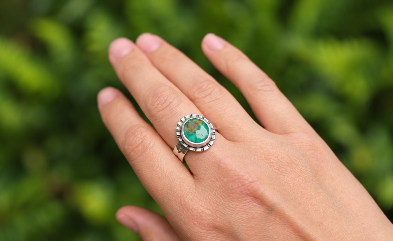 Handmade silver ring with a green turquoise stone