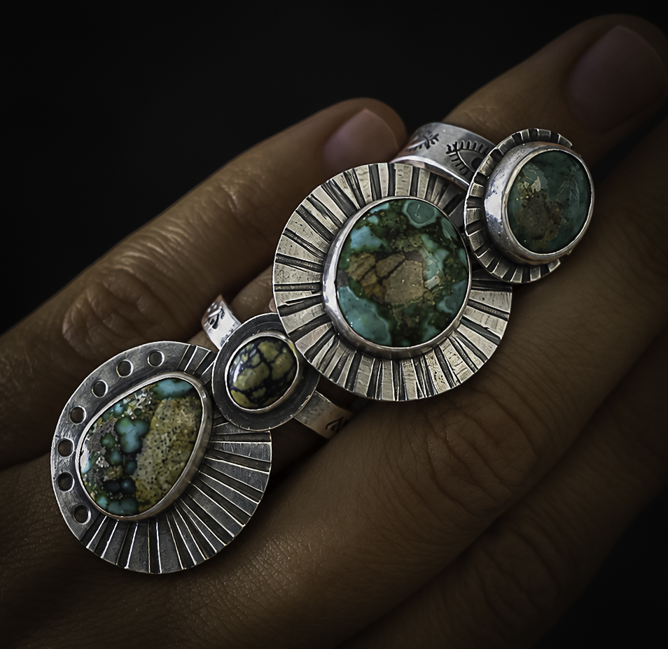 Collection of handmade silver statement rings set with turquoise